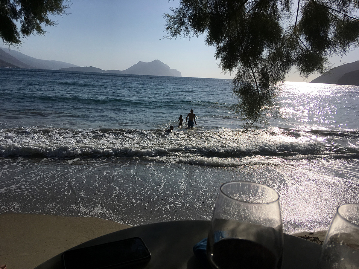 The beach at Aigiali looking towards the iconic island of Nikouria. Lakki, Amorgos